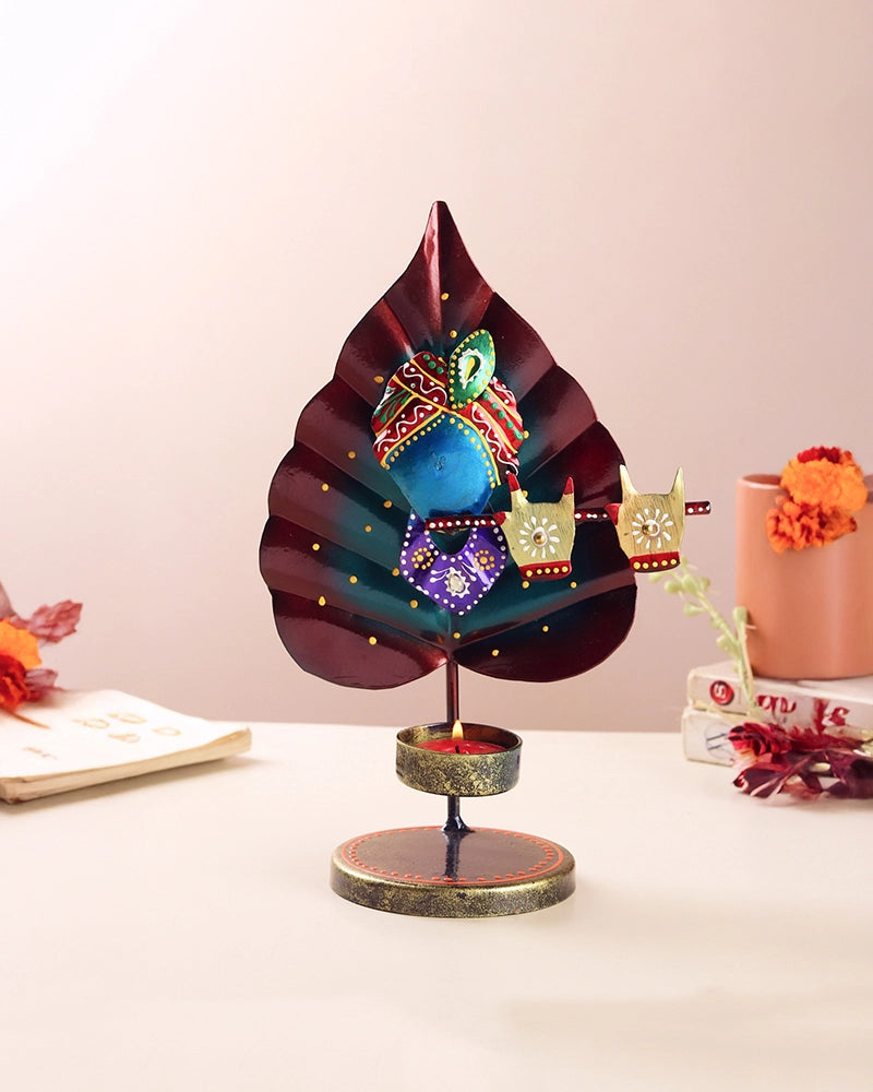 Handcrafted Metal Peepal Leaf Krishna Tealight Holder Showpiece
