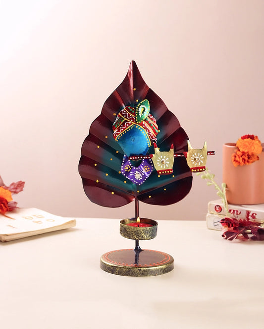 Handcrafted Metal Peepal Leaf Krishna Tealight Holder Showpiece