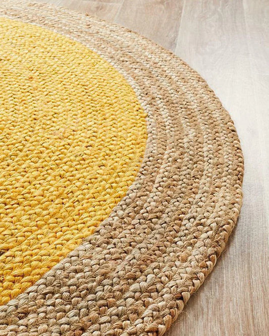 Handcrafted Natural Yellow Round Jute Carpet For Dining Space